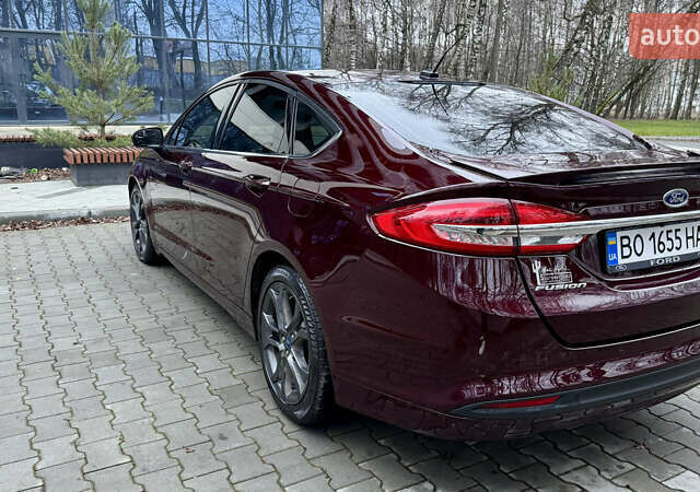 Червоний Форд Фьюжен, об'ємом двигуна 2.49 л та пробігом 122 тис. км за 11800 $, фото 4 на Automoto.ua
