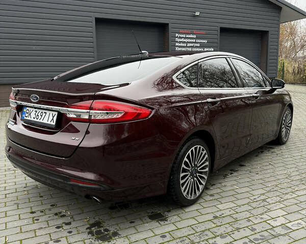 Красный Форд Фьюжн, объемом двигателя 2 л и пробегом 107 тыс. км за 13700 $, фото 9 на Automoto.ua