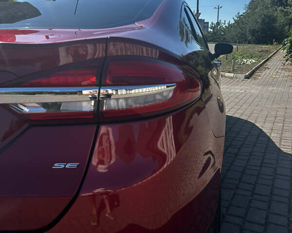 Красный Форд Фьюжн, объемом двигателя 2 л и пробегом 160 тыс. км за 15500 $, фото 4 на Automoto.ua