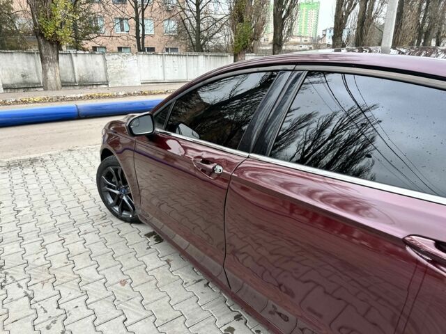 Красный Форд Фьюжн, объемом двигателя 2 л и пробегом 118 тыс. км за 337 $, фото 2 на Automoto.ua