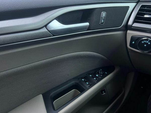 Червоний Форд Фьюжен, об'ємом двигуна 2 л та пробігом 217 тис. км за 12999 $, фото 15 на Automoto.ua