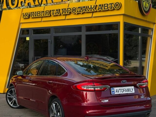 Червоний Форд Фьюжен, об'ємом двигуна 2 л та пробігом 206 тис. км за 12999 $, фото 5 на Automoto.ua