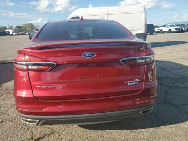 Красный Форд Фьюжн, объемом двигателя 2 л и пробегом 82 тыс. км за 2400 $, фото 5 на Automoto.ua