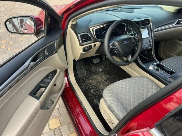 Червоний Форд Фьюжен, об'ємом двигуна 2 л та пробігом 217 тис. км за 12999 $, фото 3 на Automoto.ua