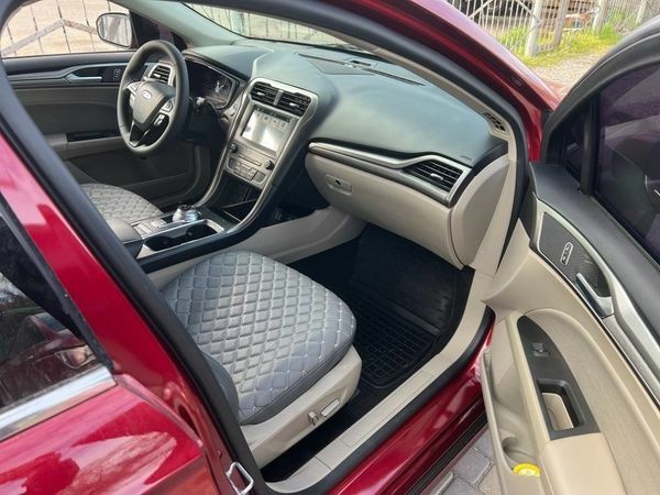 Червоний Форд Фьюжен, об'ємом двигуна 2 л та пробігом 217 тис. км за 12999 $, фото 5 на Automoto.ua