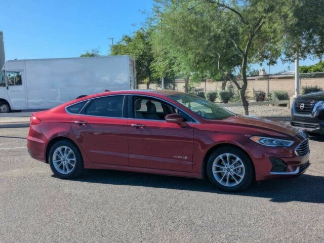 Красный Форд Фьюжн, объемом двигателя 2 л и пробегом 34 тыс. км за 11900 $, фото 2 на Automoto.ua