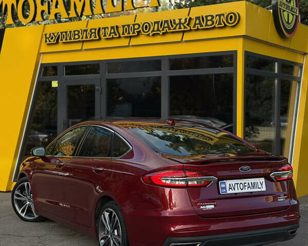 Червоний Форд Фьюжен, об'ємом двигуна 2 л та пробігом 207 тис. км за 12999 $, фото 5 на Automoto.ua