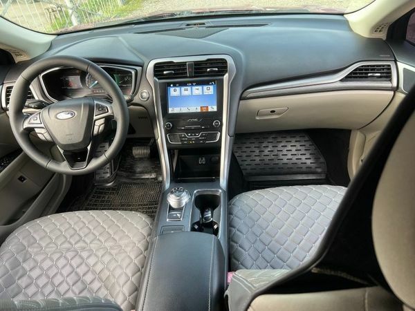 Червоний Форд Фьюжен, об'ємом двигуна 2 л та пробігом 217 тис. км за 12999 $, фото 1 на Automoto.ua