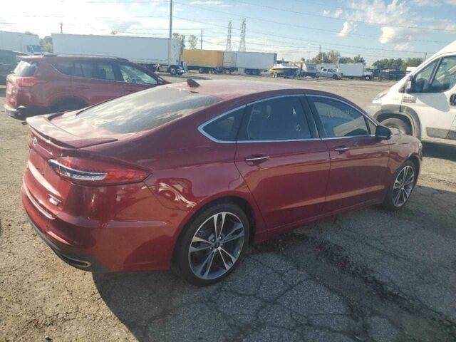 Красный Форд Фьюжн, объемом двигателя 2 л и пробегом 82 тыс. км за 2400 $, фото 2 на Automoto.ua