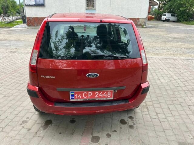 Красный Форд Фьюжн, объемом двигателя 1.3 л и пробегом 155 тыс. км за 3999 $, фото 11 на Automoto.ua