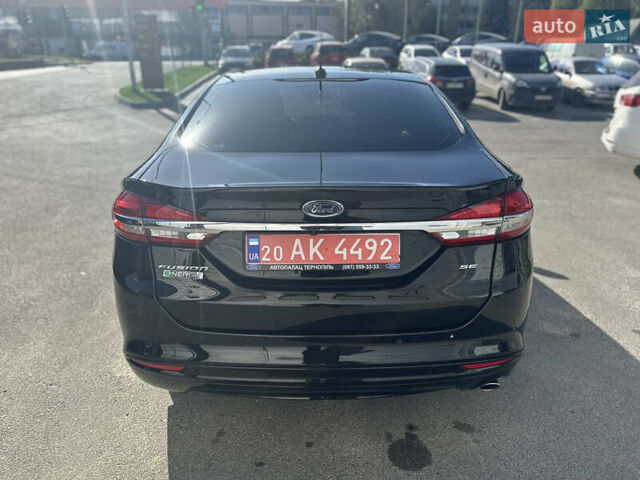 Форд Фьюжн, объемом двигателя 2 л и пробегом 97 тыс. км за 15250 $, фото 4 на Automoto.ua
