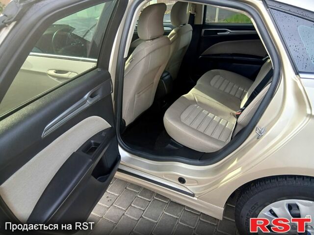 Желтый Форд Фьюжн, объемом двигателя 2.5 л и пробегом 178 тыс. км за 12200 $, фото 9 на Automoto.ua