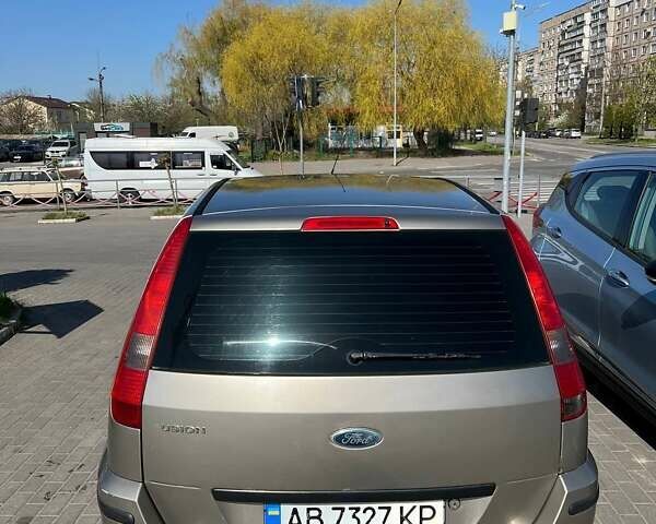 Серый Форд Фьюжн, объемом двигателя 1.6 л и пробегом 317 тыс. км за 4000 $, фото 7 на Automoto.ua