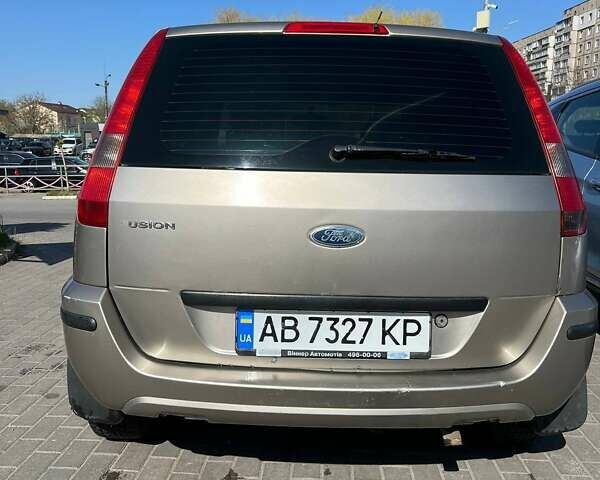 Серый Форд Фьюжн, объемом двигателя 1.6 л и пробегом 317 тыс. км за 4000 $, фото 14 на Automoto.ua