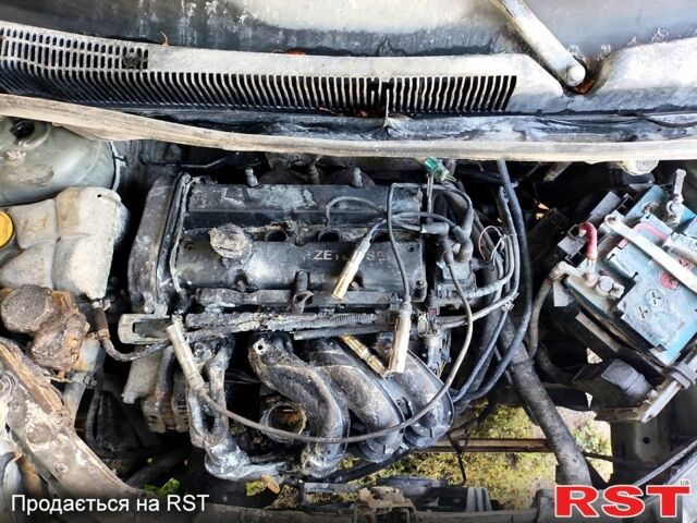 Сірий Форд Фьюжен, об'ємом двигуна 1.4 л та пробігом 311 тис. км за 1500 $, фото 5 на Automoto.ua