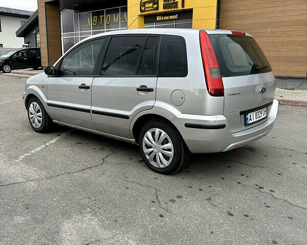 Серый Форд Фьюжн, объемом двигателя 1.39 л и пробегом 250 тыс. км за 3950 $, фото 9 на Automoto.ua