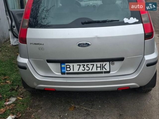 Серый Форд Фьюжн, объемом двигателя 1.4 л и пробегом 210 тыс. км за 2850 $, фото 8 на Automoto.ua