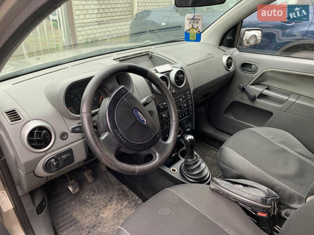 Серый Форд Фьюжн, объемом двигателя 1.39 л и пробегом 300 тыс. км за 2850 $, фото 7 на Automoto.ua