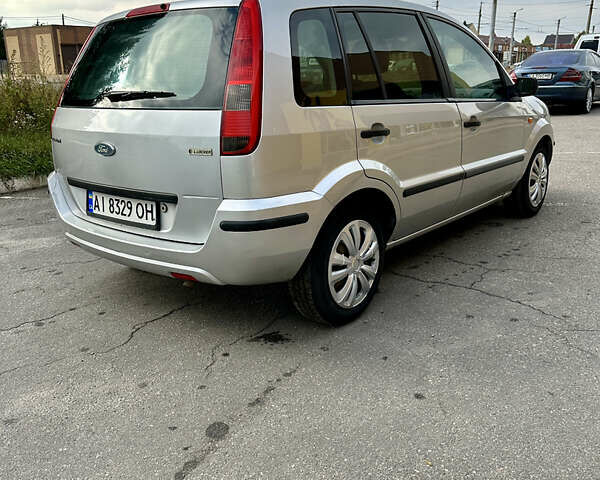 Серый Форд Фьюжн, объемом двигателя 1.39 л и пробегом 250 тыс. км за 3950 $, фото 16 на Automoto.ua