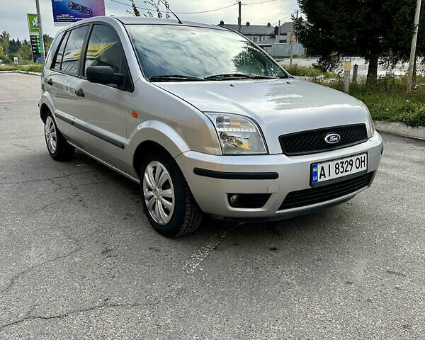 Серый Форд Фьюжн, объемом двигателя 1.39 л и пробегом 250 тыс. км за 3950 $, фото 20 на Automoto.ua