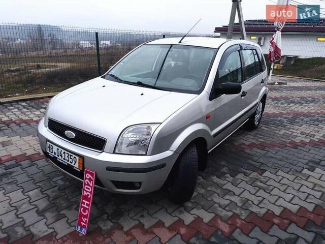 Серый Форд Фьюжн, объемом двигателя 1.6 л и пробегом 238 тыс. км за 4450 $, фото 10 на Automoto.ua