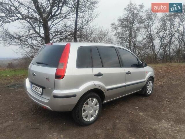 Серый Форд Фьюжн, объемом двигателя 1.39 л и пробегом 130 тыс. км за 4200 $, фото 4 на Automoto.ua