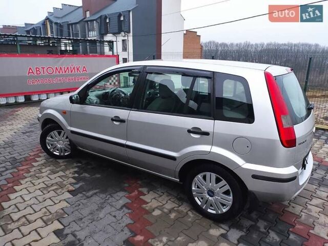 Серый Форд Фьюжн, объемом двигателя 1.6 л и пробегом 238 тыс. км за 4450 $, фото 7 на Automoto.ua