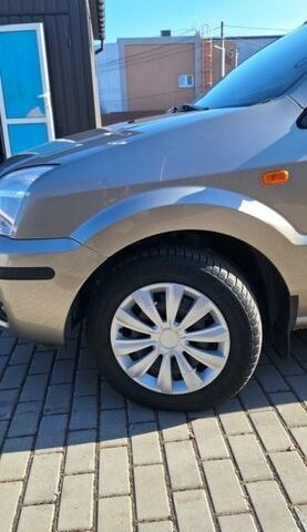 Серый Форд Фьюжн, объемом двигателя 1.39 л и пробегом 202 тыс. км за 4555 $, фото 5 на Automoto.ua