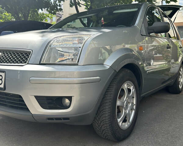 Сірий Форд Фьюжен, об'ємом двигуна 1.39 л та пробігом 216 тис. км за 5000 $, фото 38 на Automoto.ua