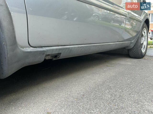 Сірий Форд Фьюжен, об'ємом двигуна 1.39 л та пробігом 216 тис. км за 5000 $, фото 28 на Automoto.ua