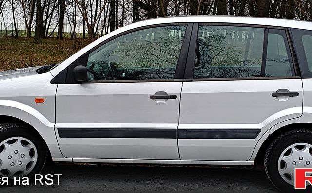 Серый Форд Фьюжн, объемом двигателя 1.2 л и пробегом 200 тыс. км за 3700 $, фото 3 на Automoto.ua