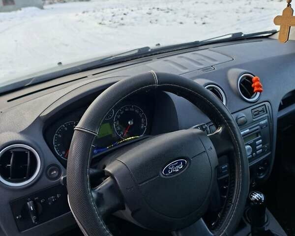 Сірий Форд Фьюжен, об'ємом двигуна 1.39 л та пробігом 77 тис. км за 5300 $, фото 9 на Automoto.ua