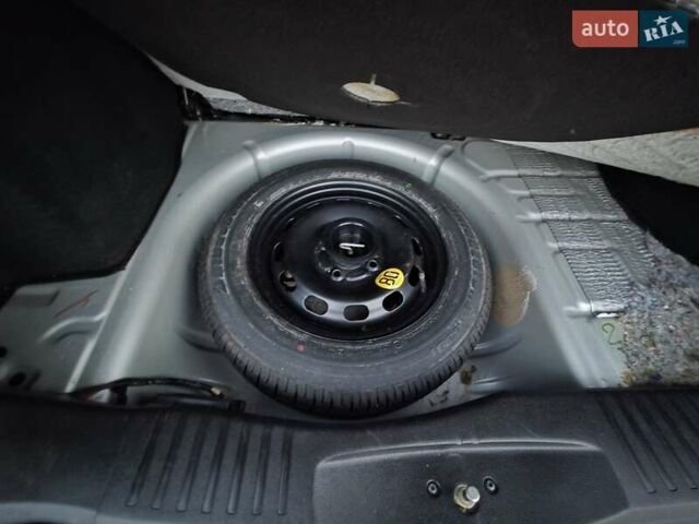 Серый Форд Фьюжн, объемом двигателя 1.2 л и пробегом 160 тыс. км за 4350 $, фото 24 на Automoto.ua