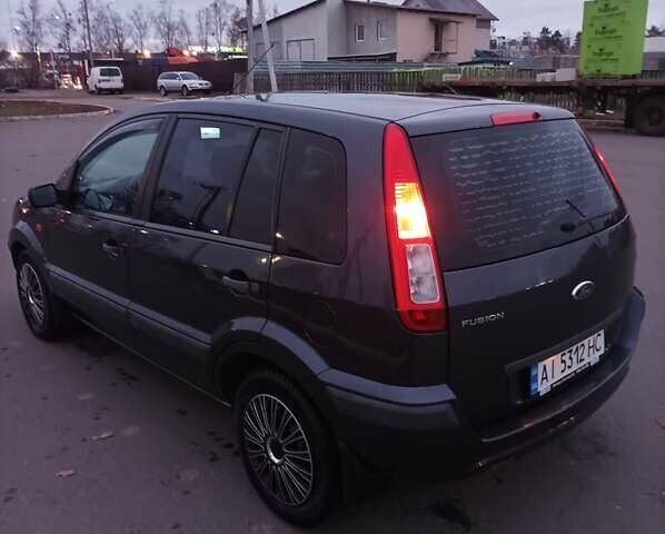 Серый Форд Фьюжн, объемом двигателя 1.39 л и пробегом 210 тыс. км за 4300 $, фото 10 на Automoto.ua