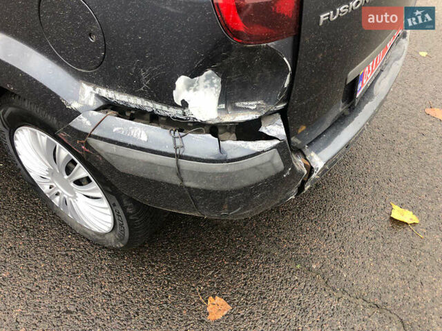 Серый Форд Фьюжн, объемом двигателя 1.6 л и пробегом 149 тыс. км за 5399 $, фото 9 на Automoto.ua