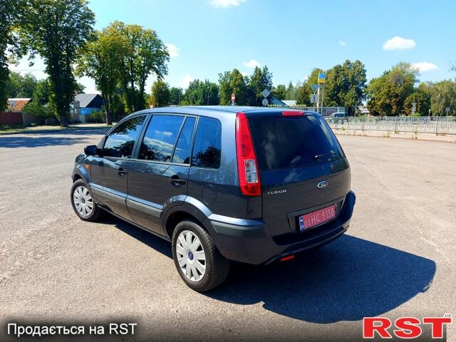 Серый Форд Фьюжн, объемом двигателя 1.4 л и пробегом 140 тыс. км за 5300 $, фото 2 на Automoto.ua