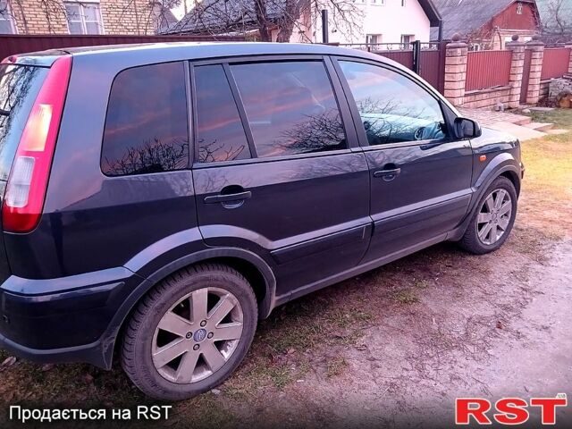 Сірий Форд Фьюжен, об'ємом двигуна 14 л та пробігом 192 тис. км за 4800 $, фото 1 на Automoto.ua