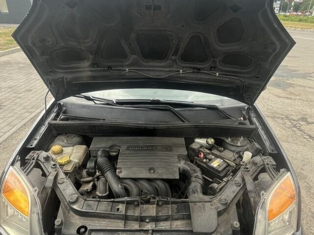 Серый Форд Фьюжн, объемом двигателя 1.6 л и пробегом 236 тыс. км за 4999 $, фото 12 на Automoto.ua