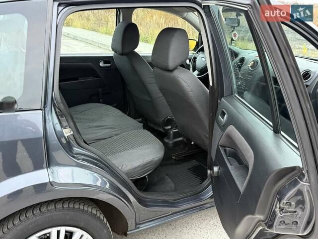 Серый Форд Фьюжн, объемом двигателя 1.39 л и пробегом 111 тыс. км за 6300 $, фото 6 на Automoto.ua