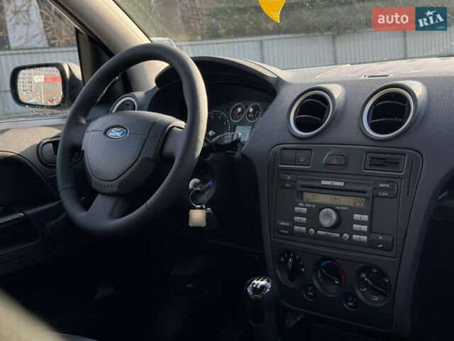Серый Форд Фьюжн, объемом двигателя 1.4 л и пробегом 235 тыс. км за 3900 $, фото 10 на Automoto.ua