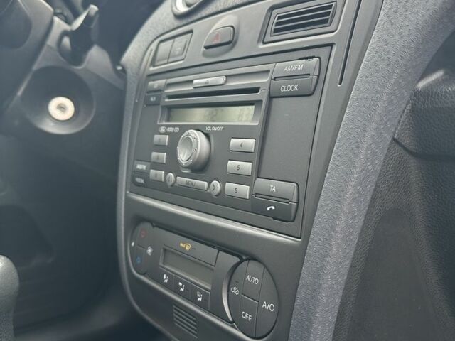 Серый Форд Фьюжн, объемом двигателя 1.4 л и пробегом 217 тыс. км за 5600 $, фото 8 на Automoto.ua