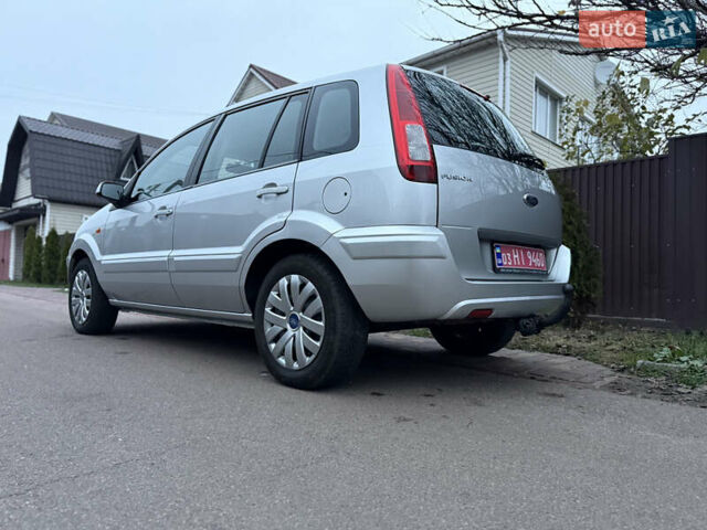 Серый Форд Фьюжн, объемом двигателя 1.4 л и пробегом 173 тыс. км за 5500 $, фото 11 на Automoto.ua