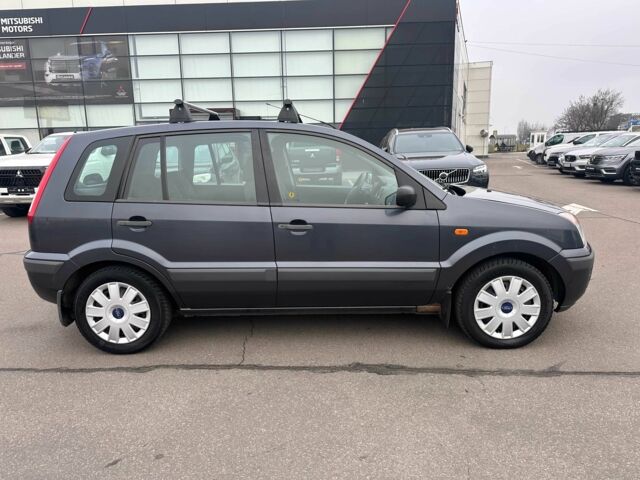 Серый Форд Фьюжн, объемом двигателя 1.4 л и пробегом 178 тыс. км за 3900 $, фото 7 на Automoto.ua