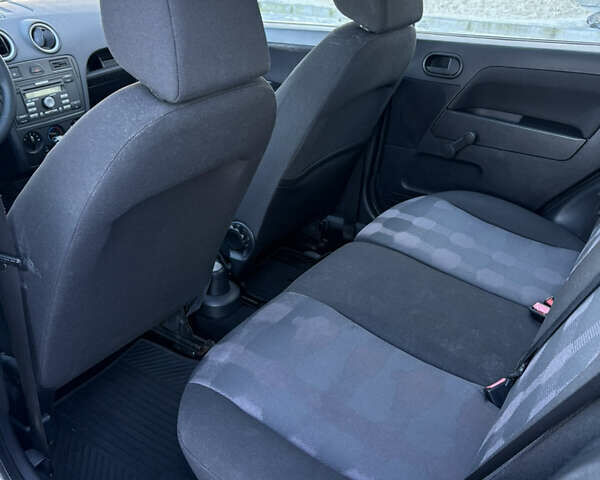 Серый Форд Фьюжн, объемом двигателя 1.4 л и пробегом 236 тыс. км за 4150 $, фото 12 на Automoto.ua