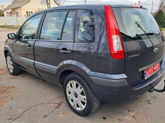 Серый Форд Фьюжн, объемом двигателя 1.4 л и пробегом 228 тыс. км за 4900 $, фото 5 на Automoto.ua