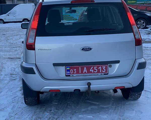 Серый Форд Фьюжн, объемом двигателя 1.6 л и пробегом 121 тыс. км за 5600 $, фото 7 на Automoto.ua