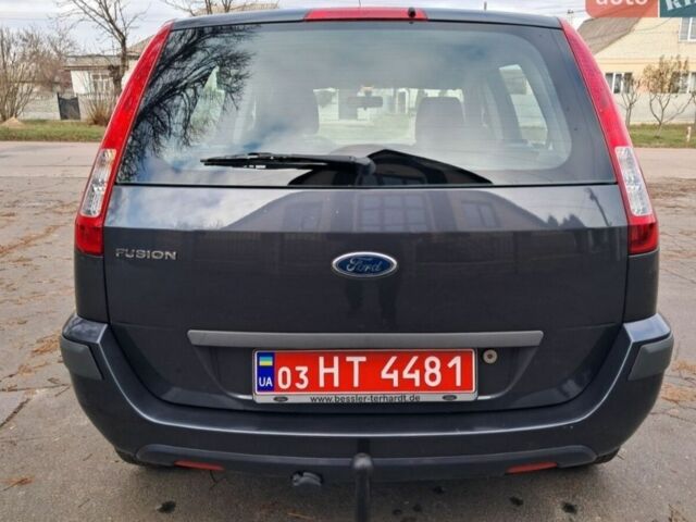 Серый Форд Фьюжн, объемом двигателя 1.4 л и пробегом 228 тыс. км за 4900 $, фото 4 на Automoto.ua