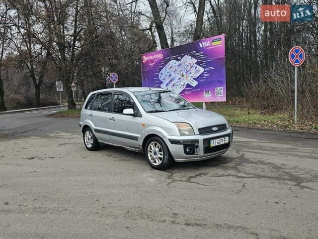 Серый Форд Фьюжн, объемом двигателя 1.39 л и пробегом 710 тыс. км за 2700 $, фото 10 на Automoto.ua