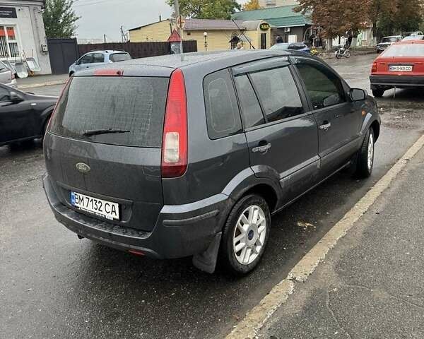 Серый Форд Фьюжн, объемом двигателя 1.4 л и пробегом 195 тыс. км за 5450 $, фото 1 на Automoto.ua