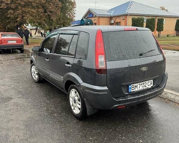 Серый Форд Фьюжн, объемом двигателя 1.4 л и пробегом 195 тыс. км за 5450 $, фото 2 на Automoto.ua